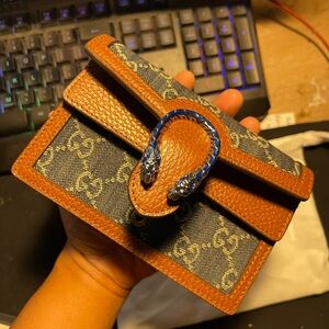 Gucci blue and brown crossbody bag.